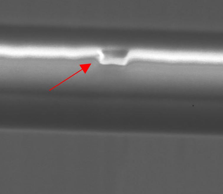 Metallic bridge defect
